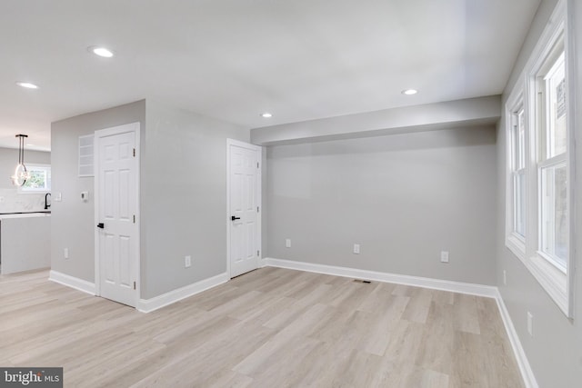 5002 Chalgrove Ave, Baltimore, MD 21215 - spare room featuring light wood-style flooring, recessed lighting, and baseboards