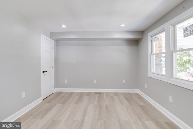 5002 Chalgrove Ave, Baltimore, MD 21215 - empty room with light wood finished floors, recessed lighting, and baseboards