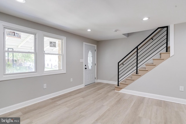 5002 Chalgrove Ave, Baltimore, MD 21215 - foyer entrance featuring wood finished floors, stairway, baseboards, and recessed lighting