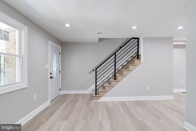 5002 Chalgrove Ave, Baltimore, MD 21215 - entrance foyer with wood finished floors, stairway, baseboards, and recessed lighting