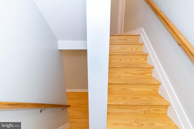 618 N American St, Philadelphia, PA 19123 - stairs featuring baseboards and wood finished floors