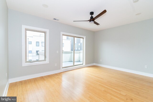 618 N American St, Philadelphia, PA 19123 - unfurnished room featuring a ceiling fan, wood finished floors, and baseboards