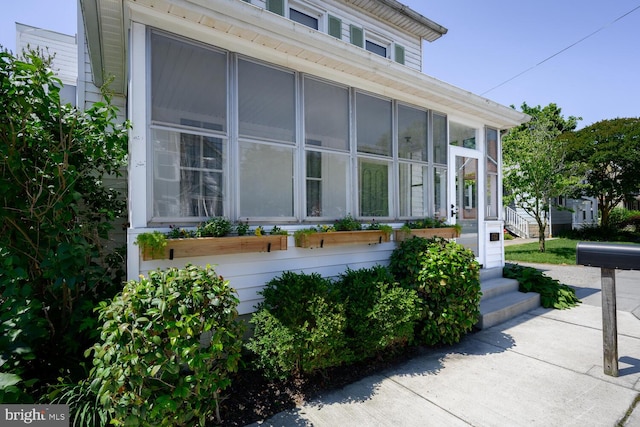 389 Cypress St, Millington, MD 21651 - view of side of home with a sunroom