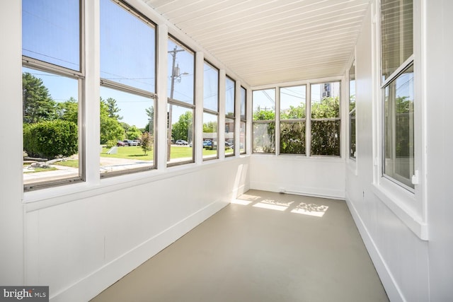 389 Cypress St, Millington, MD 21651 - unfurnished sunroom with plenty of natural light, concrete flooring, and baseboards