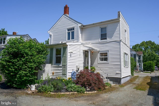 389 Cypress St, Millington, MD 21651 - traditional-style home featuring a chimney