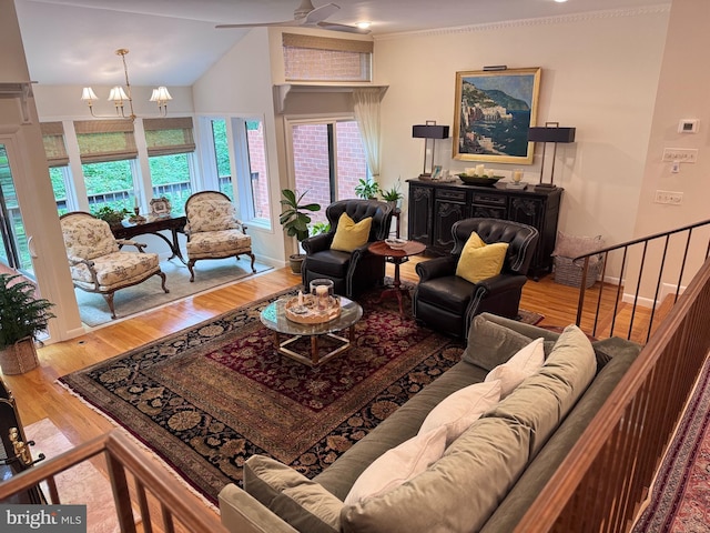 10 Malibu Ct, Towson, MD 21204 - living area with wood finished floors, ceiling fan, baseboards, and lofted ceiling