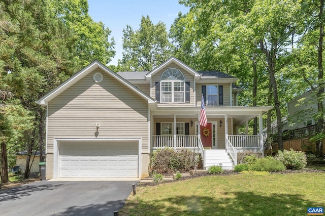 14 Patriot Ln, Palmyra, VA 22963 - view of front of property with asphalt driveway, covered porch, and a front lawn