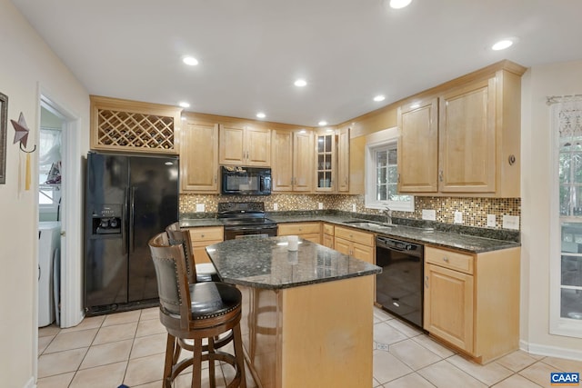 14 Patriot Ln, Palmyra, VA 22963 - kitchen with black appliances, light brown cabinetry, a sink, a kitchen island, and recessed lighting