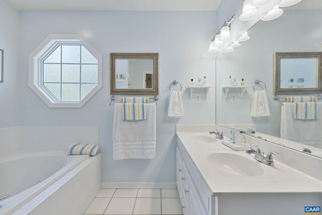 14 Patriot Ln, Palmyra, VA 22963 - full bathroom featuring tile patterned flooring, a garden tub, baseboards, and double vanity