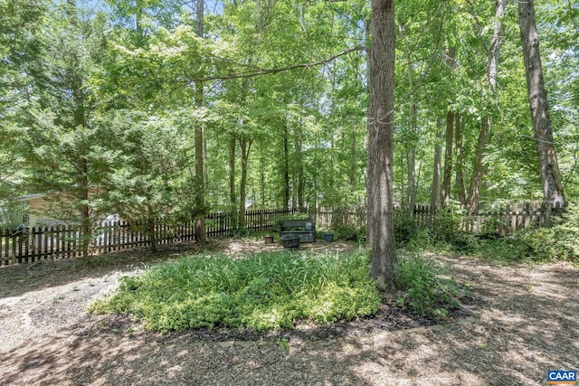 14 Patriot Ln, Palmyra, VA 22963 - fenced yard featuring a forest view