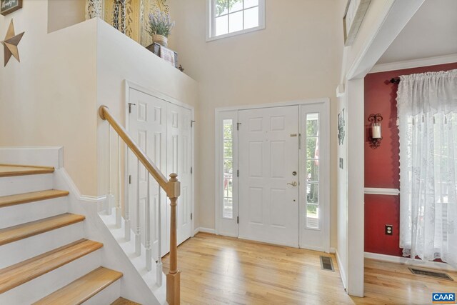 14 Patriot Ln, Palmyra, VA 22963 - foyer entrance with wood finished floors, stairway, a high ceiling, and baseboards