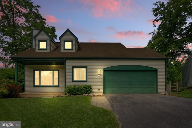 5762 Lichenbark Cir, New Market, MD 21774 - cape cod home featuring asphalt driveway, a chimney, a front yard, and a garage