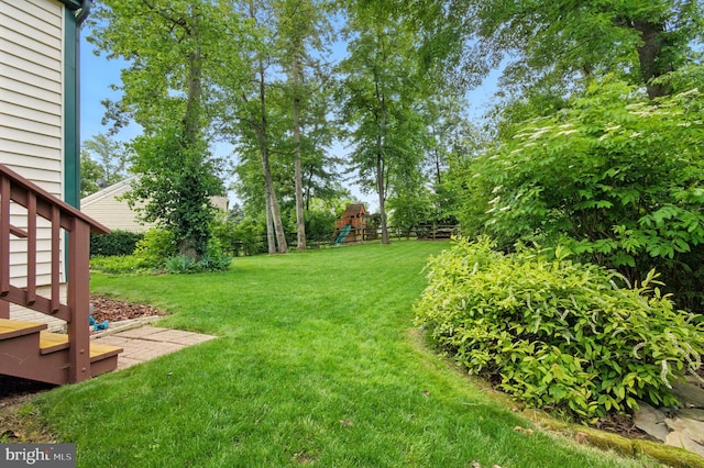 5762 Lichenbark Cir, New Market, MD 21774 - view of green lawn featuring a playground