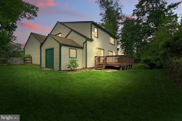 5762 Lichenbark Cir, New Market, MD 21774 - back of house at dusk with a wooden deck
