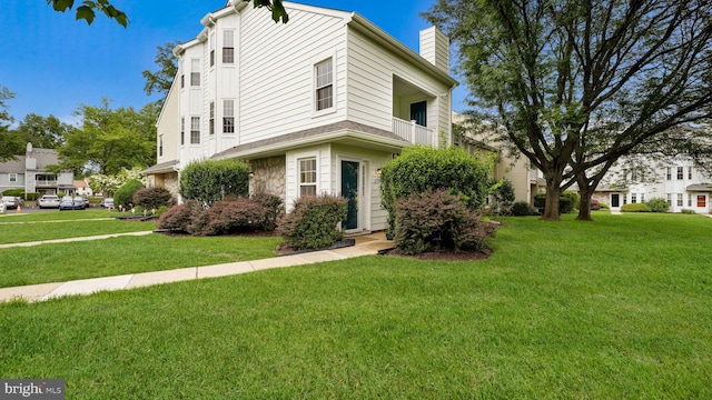 1703 Hopkins Ct, Southampton, PA 18966 - view of front of home with a chimney, a front yard, and stone siding