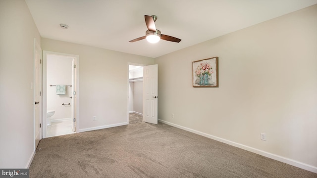 1703 Hopkins Ct, Southampton, PA 18966 - unfurnished bedroom with a walk in closet, carpet, ensuite bathroom, a closet, and ceiling fan