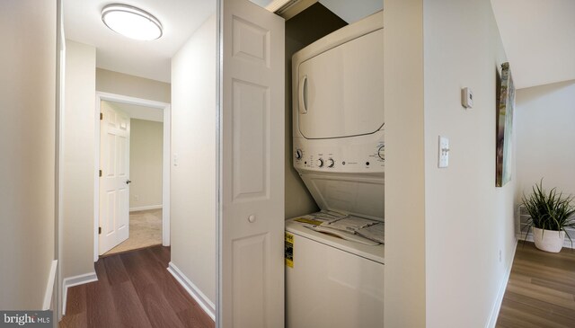 1703 Hopkins Ct, Southampton, PA 18966 - washroom featuring stacked washer / dryer and dark wood-style flooring