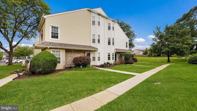 1703 Hopkins Ct, Southampton, PA 18966 - view of front of house featuring stone siding and a front yard
