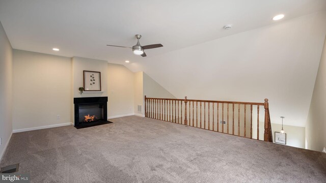 1703 Hopkins Ct, Southampton, PA 18966 - unfurnished living room with a ceiling fan, carpet, recessed lighting, lofted ceiling, and a fireplace with flush hearth