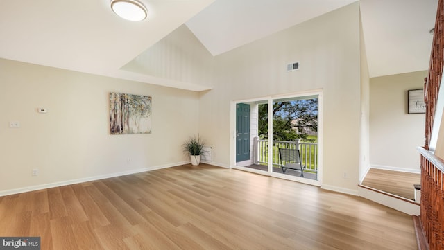 1703 Hopkins Ct, Southampton, PA 18966 - empty room featuring high vaulted ceiling and light wood finished floors