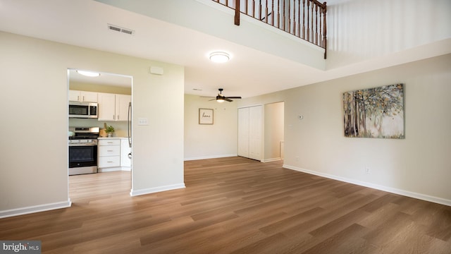 1703 Hopkins Ct, Southampton, PA 18966 - unfurnished living room featuring light wood-style floors and a ceiling fan