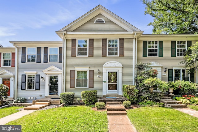 49 Huntley Ct, Sterling, VA 20165 - view of property with a front yard