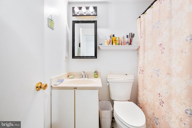 49 Huntley Ct, Sterling, VA 20165 - bathroom featuring toilet, vanity, and curtained shower