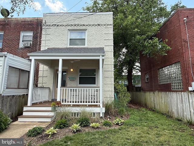 11 Clifford Ave, Alexandria, VA 22305 - view of front of property featuring a porch, a shingled roof, brick siding, and cooling unit