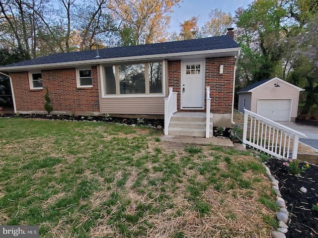 27 Carlisle St, Browns Mills, NJ 08015 - ranch-style house featuring brick siding, an outdoor structure, a garage, and a chimney