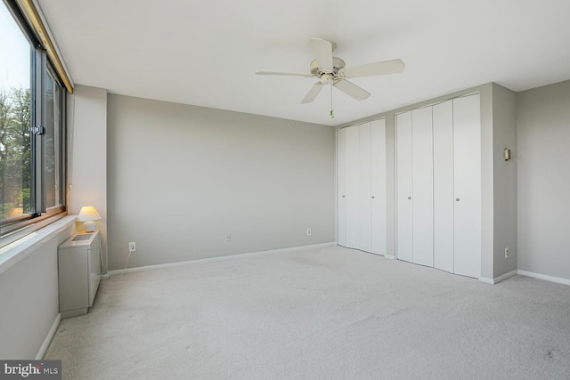 600 Roosevelt Blvd Unit 510, Falls Church, VA 22044 - unfurnished bedroom featuring multiple closets, light colored carpet, and ceiling fan