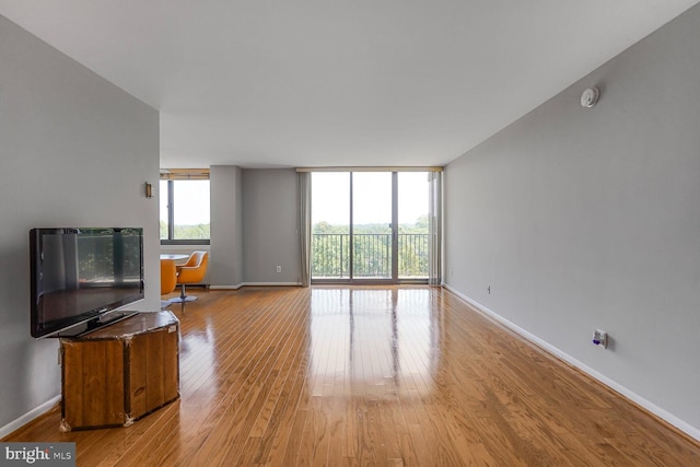 600 Roosevelt Blvd Unit 510, Falls Church, VA 22044 - unfurnished living room with light wood finished floors and floor to ceiling windows
