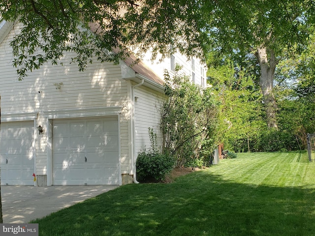 85 Creekwood Dr, Bordentown, NJ 08505 - view of home's exterior featuring a lawn, an attached garage, and driveway