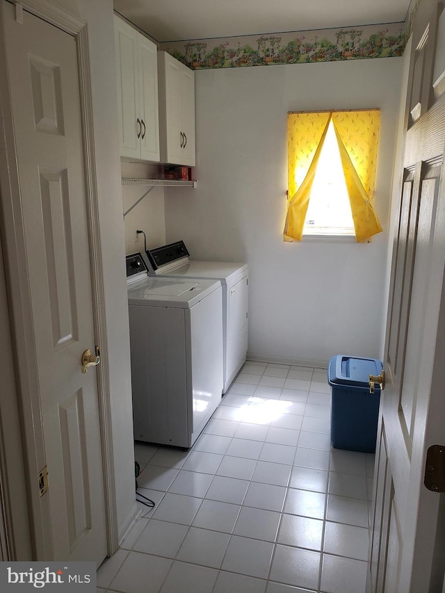 85 Creekwood Dr, Bordentown, NJ 08505 - laundry room featuring washing machine and clothes dryer, cabinet space, and light tile patterned floors