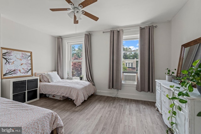 327 W Fourth St, Media, PA 19063 - bedroom featuring multiple windows, light wood-style floors, and ceiling fan