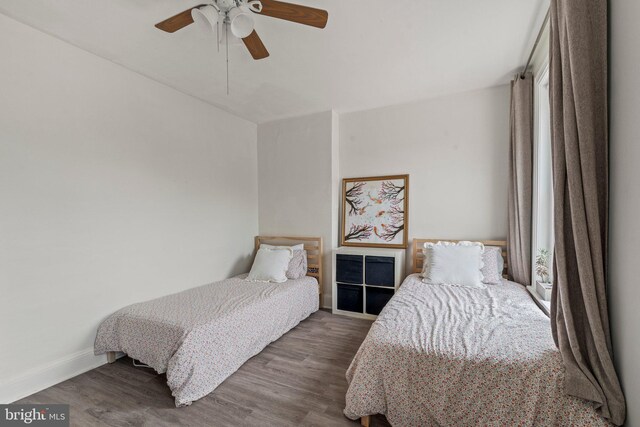 327 W Fourth St, Media, PA 19063 - bedroom with baseboards, wood finished floors, and a ceiling fan