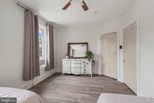 327 W Fourth St, Media, PA 19063 - bedroom with wood finished floors, baseboards, and a ceiling fan
