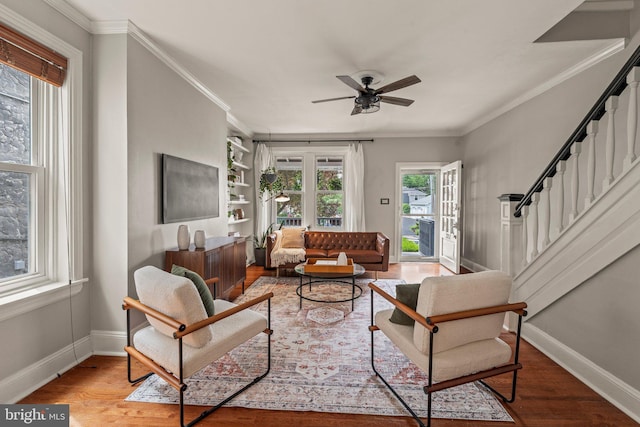 327 W Fourth St, Media, PA 19063 - living room with wood finished floors, stairs, ceiling fan, baseboards, and crown molding