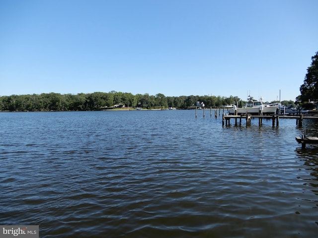 7638 Laurel Dr, Pasadena, MD 21122 - dock area featuring a water view and boat lift