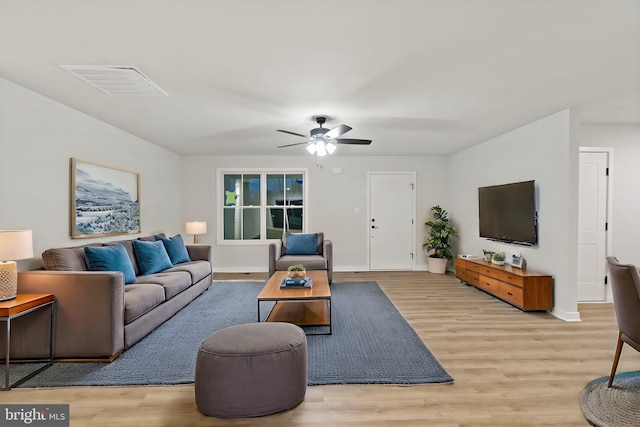 183 Silage Ln, Berkeley Springs, WV 25411 - living area with ceiling fan, light wood-style floors, and baseboards