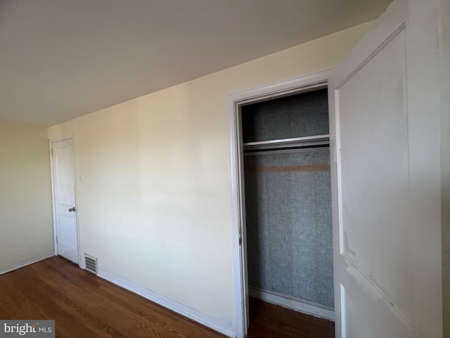 331 Garden Ave, Camden, NJ 08105 - unfurnished bedroom with wood finished floors, a closet, and baseboards