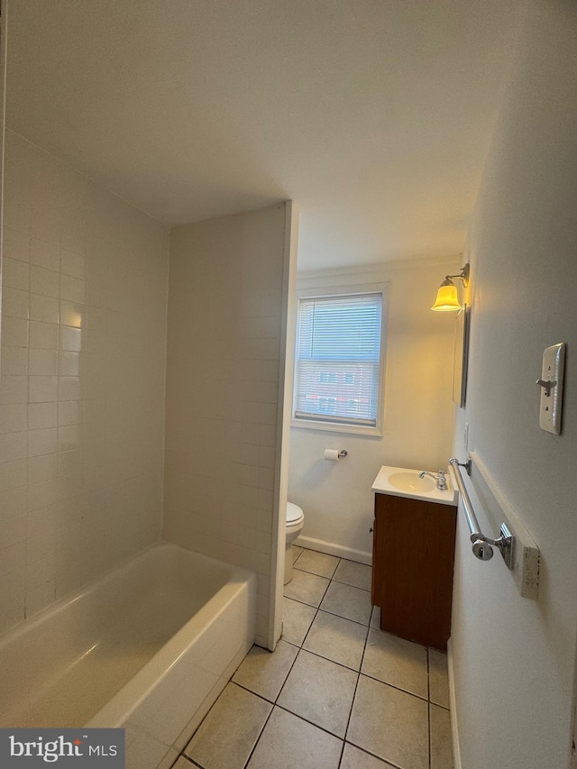 331 Garden Ave, Camden, NJ 08105 - bathroom with toilet, vanity, tile patterned flooring, and baseboards