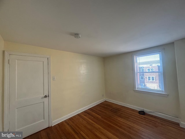 331 Garden Ave, Camden, NJ 08105 - spare room with wood finished floors, baseboards, and a smoke detector