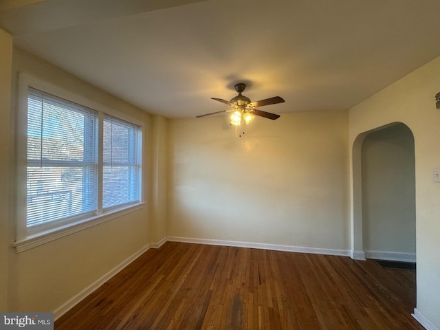 331 Garden Ave, Camden, NJ 08105 - spare room featuring dark wood-style floors, baseboards, and ceiling fan