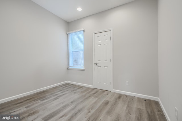 1229 N Potomac St, Baltimore, MD 21213 - unfurnished room featuring wood finished floors, baseboards, and recessed lighting