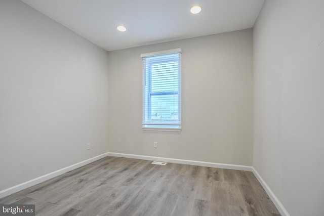 1229 N Potomac St, Baltimore, MD 21213 - unfurnished room featuring wood finished floors, baseboards, and recessed lighting