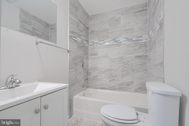 1229 N Potomac St, Baltimore, MD 21213 - bathroom featuring toilet, bathtub / shower combination, vanity, and marble look tile flooring