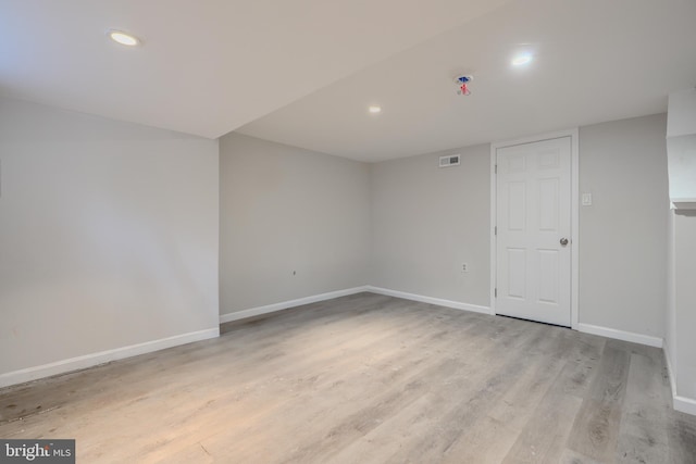 1229 N Potomac St, Baltimore, MD 21213 - unfurnished room featuring baseboards, light wood-style floors, and recessed lighting