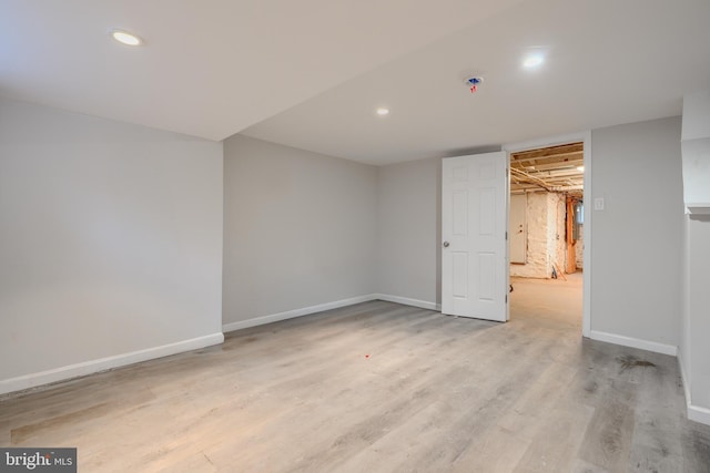 1229 N Potomac St, Baltimore, MD 21213 - unfurnished bedroom with light wood-type flooring, baseboards, and recessed lighting