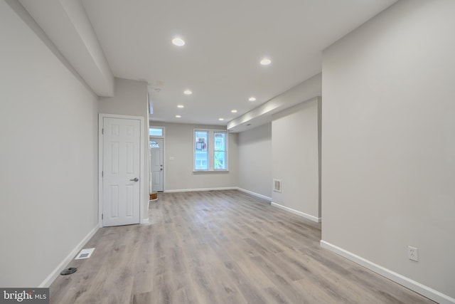 1229 N Potomac St, Baltimore, MD 21213 - spare room with recessed lighting, baseboards, and light wood-type flooring