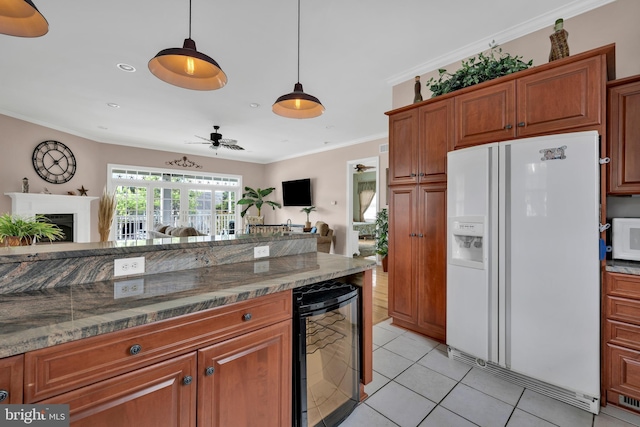 107 Swedes St, Dewey Beach, DE 19971 - kitchen featuring white appliances, wine cooler, open floor plan, light tile patterned floors, and crown molding